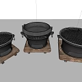 Three Cast Iron Kitchen Appliances With Wooden Base And Mesh Grills For Home Cooking