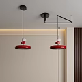 Two Red Round Modern Pendant Lights Hanging In Minimalist Interior Space 3d model