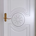 White Hinged Door With Carved Design And Gold Handle Decorative Pattern 3d model