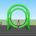 Little Girl Sitting on Green Circular Landscape Seat by Beach with Blue Sky and Sea