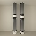 Two Tall Gray Columns With White Ring Decorations In Light Colored Room Interior