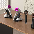 Modern Hair Dryers With Pink Black White Nozzles On Wooden Table Stand