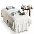 Comfortable Massage Bed With White Linen Stacked Towels And Side Table With Candles