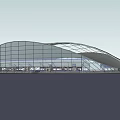 Modern Large Building Featuring Glass Curved Roof And Transparent Facade Structure