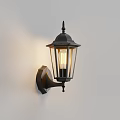 Black Classic Design Wall Lamp With Clear Glass Shade Mounted On White Wall