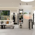 Modern Clothing Store Interior With Mannequins Display Racks And Cashier Counter