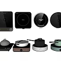 Assorted Modern Kitchen Appliances Featuring Countertop Electric Cooktops And Pots 3d model