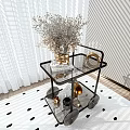 Modern Black Metal Frame Side Table with Glass Shelves Vase Books and Golden Decor