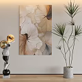 Abstract Painting With Leaf Patterns And Beige Brown Tones Near Astronaut Figurine And Potted Plant