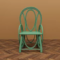 Green Curved Design Dining Chair Against Brown Wall With Herringbone Wood Floor