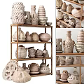 Various Handcrafted Ceramic Vessels Displayed on Wooden Shelves with Unique Patterns