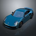 Blue Sports Car With Sleek Design Rear Spoiler Alloy Wheels And Shiny Exterior
