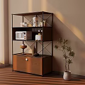 Modern Shelf Unit With Wooden Drawer And Decorative Items Near Potted Plant