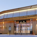 Modern Wooden Storefront Design With Large Glass Windows Canopy And Outdoor Seating