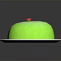 Fresh Green Cake on White Plate with Red Cherry and Green Leaf Topping