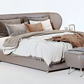 Modern Double Bed Setup With Bedside Tables Ottoman Pillows And Cozy Blankets