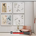 Four Decorative Paintings With Birds And Floral On Beige Wall With Chair And Side Table