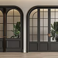 Black Arched Glass Double Doors with Metal Handles Green Plants and Wooden Floor in Interior Design