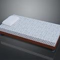 Comfortable Mattress With Patterned Surface On Wooden Bed Frame And White Pillow