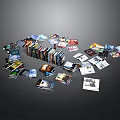 Household Items Including Books And Magazines Scattered On Black Background