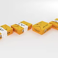 Four Yellow Decorative Ornament Set Boxes With White Labels And Straps For Home Decoration