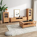Natural Wooden TV Stand With Display Cabinets Coffee Table Decorative Painting And Green Plant Accents