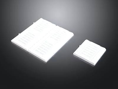 White Rectangular Electronic Components With Grid Pattern And Different Sizes 3d model
