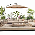 Outdoor Sofa Set on Patio with Sunshade Lush Green Plants and Coffee Table