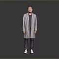 Man Wearing Grey Long Coat Black T-shirt Dark Pants And White Sneakers On Grey Background