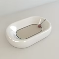 White Oval Tray With Brown Mat Red Woven Ball And Black String