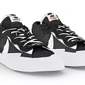 Nike Black And White Low Top Sneakers With White Sole And Lace Up Design
