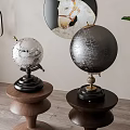 Decorative Globe Sculptures On Wooden Carved Stands With Hanging Lamp And Potted Plant