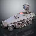 Gray Armored Utility Vehicle With Tracked Wheels Top Searchlight And Gear Bags