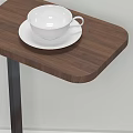 Modern Side Table With Wooden Top And Black Metal Stand Featuring White Cup And Saucer
