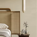 Modern Bedroom Interior Design With Rattan Headboard Pendant Light And Decorative Art