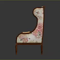 Elegant Wingback Armchair with Floral Pattern Upholstery and Brown Wooden Frame Design