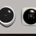 Two Modern Wall Mounted White Washing Machines With Black Panels And Digital