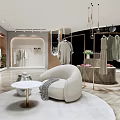 Modern Clothing Store Interior With Hanging Garments Cozy Armchair And Stylish Displays