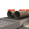 Automated Industrial Equipment With Orange Robotic Arms Handling Large Pipes On Conveyor Belts
