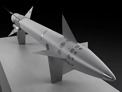 Silver Military Missile Model Featuring Pointed Nose Fins And Display Stand 3d model