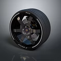 High Performance Automotive Tire With Black Alloy Rim And Five Spoke Design