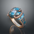 Decorative Blue Inlaid Ring With Metallic Band And Intricate Geometric Design