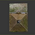 Small Chapel Like Building With Pyramidal Moss Covered Roof And Circular Window