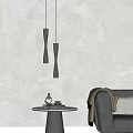 Twisted Silver and Gold Pendant Lights in Living Room with Small Table Decor and Coffee Cup