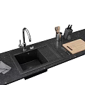 Modern Black Kitchen Sink with Faucet Cutting Board and Utensils on Countertop