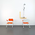 Orange Leisure Chairs with White Frame in Bright Indoor Space Near Window