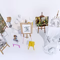 Art Supplies Collection With Easels Canvas Boards Sculpture Models And Paintings