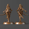 Two Golden Female Warrior Statues Holding Swords Standing On Pedestals