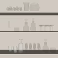 Glass Kitchenware On White Shelves With Wine Glasses Decanters And Bottles