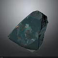 Green Raw Stone with Copper Spots and Natural Texture on Dark Reflective Surface